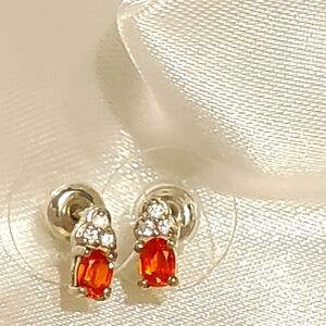 Tangerine Kyanite and White Zircon stud earrings. 40ctw in platinum over silver